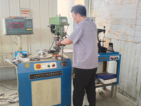 Manual balancing machine for grinding wheels